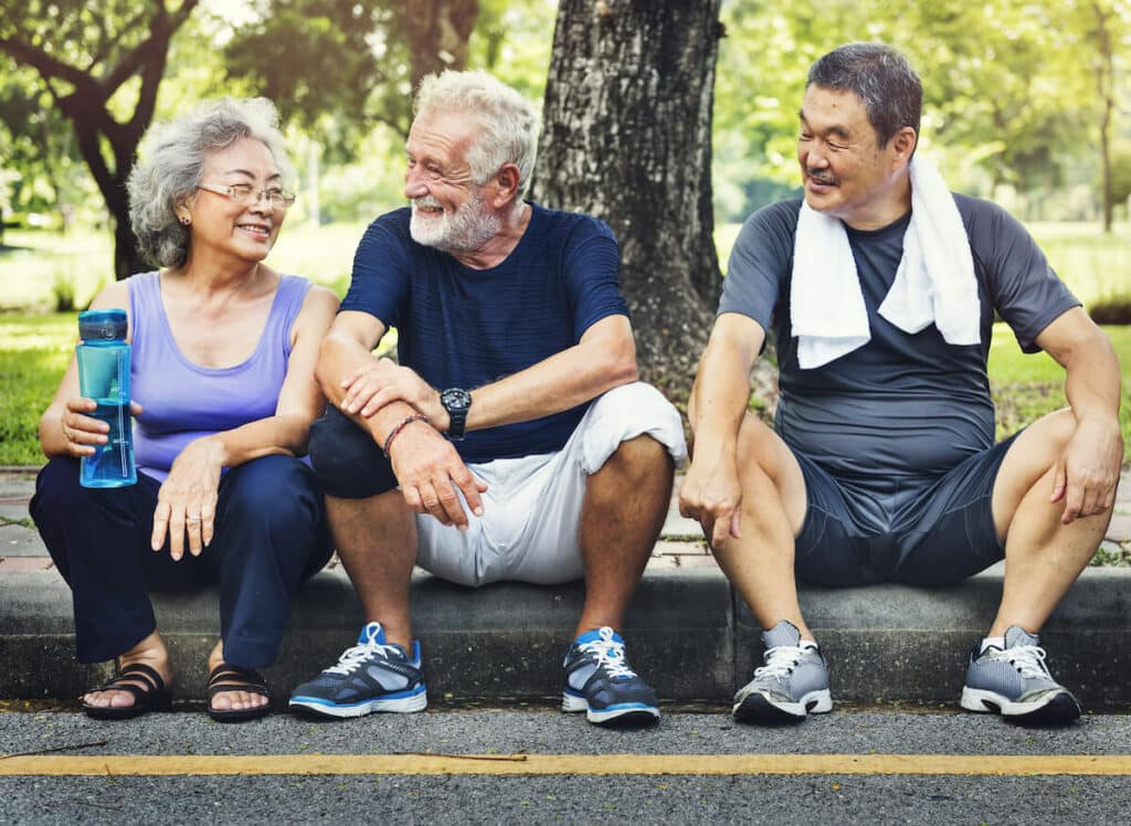 The Village at Rancho Solano | Seniors resting after exercise outdoors