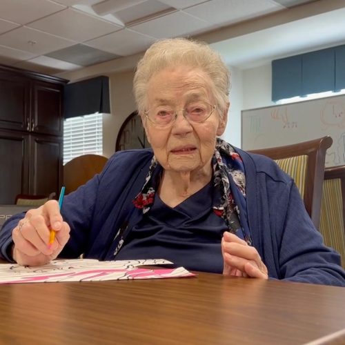 Broadway Mesa Village | Senior woman painting Broadway Mesa Village | Senior woman painting