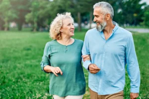 Senior couple walking on trail
