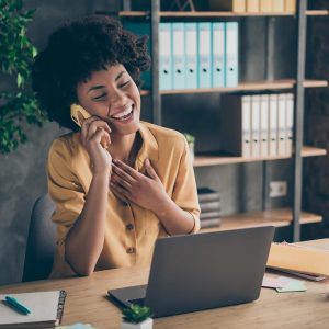 Cordata Court | Associate smiling while on the phone