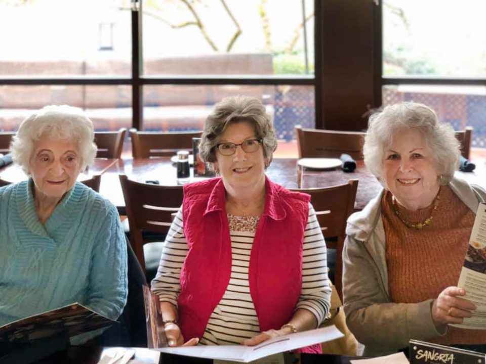 Dunwoody Place | Group of residents ordering from restaurant menu