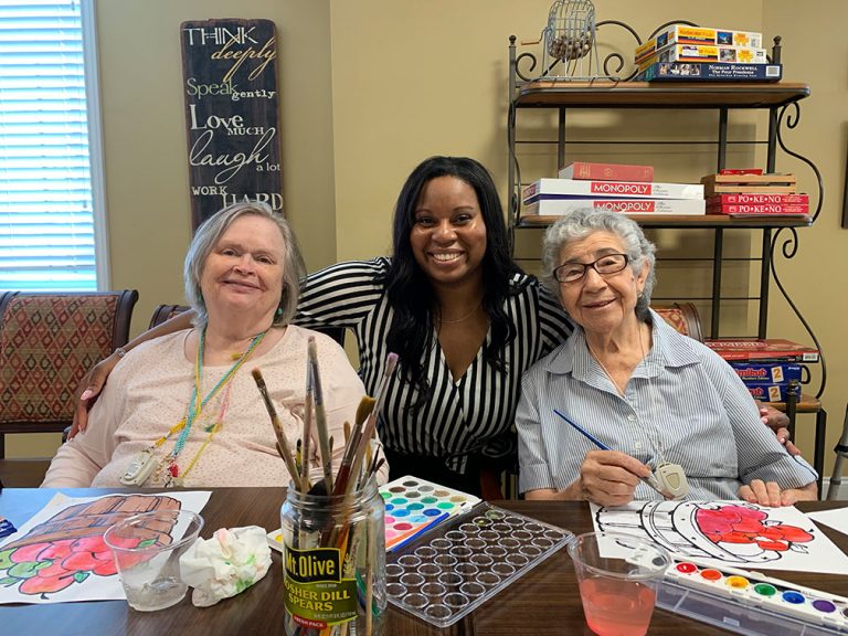 Pegasus Senior Living | Senior living residents enjoying painting activity