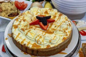 Dunwoody Place | Caramel cake with fruit on top