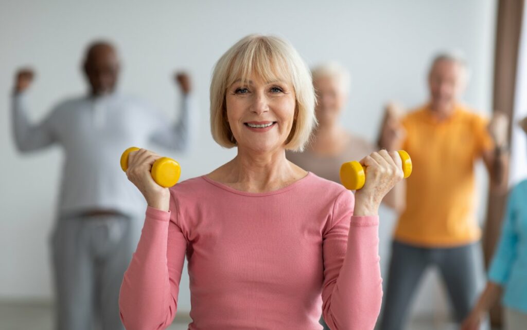 Elk Grove Park | Senior woman working out in a group