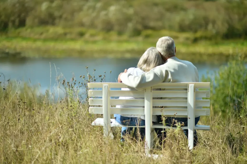 Seniors sitting by the water