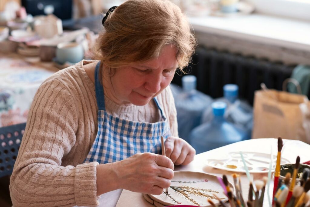 Gig Harbor Court | Senior woman painting ceramics