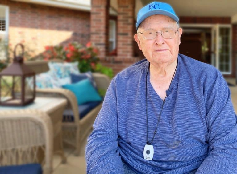 Glenwood Village of Overland Park | Senior sitting on porch