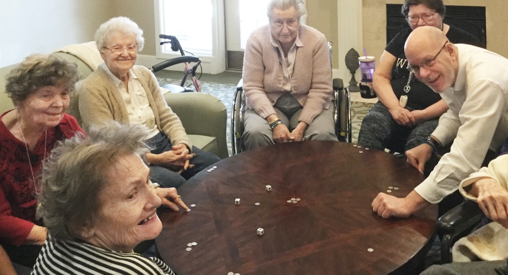 Glenwood Village of Overland Park | Group of seniors playing game