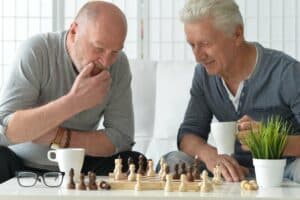 Glenwood Village of Overland Park | Senior men playing chess