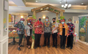 Greenhaven Place | Dining team posing in Hawaiian shirts