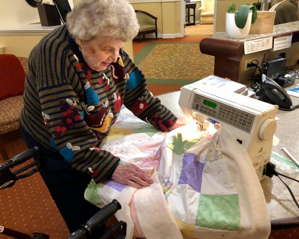 Historic Roswell Place | Resident Janet Quilting