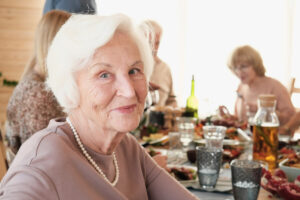 Laketown Village | Happy seniors dining together