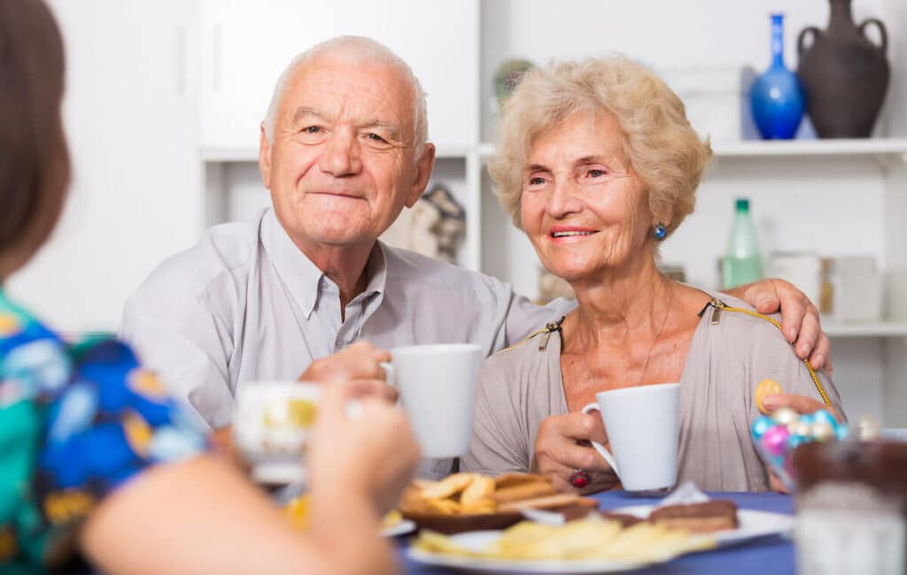 Pegasus Senior Living | Senior couple sitting at table together