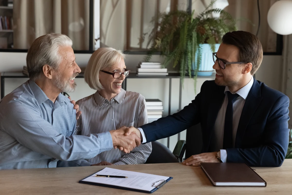 Senior couple discussing selling home