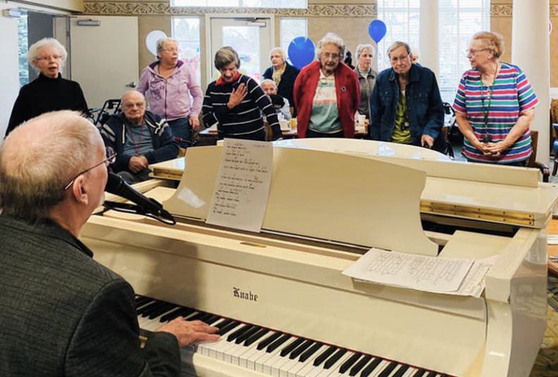 North Point Village | Residents singing and playing piano