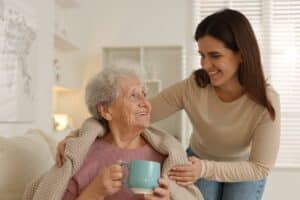 Pegasus Senior Living | Carefiver assisting resident