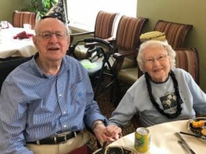 Parmer Woods at North Austin | Happy senior couple at the table