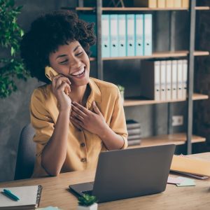 Pegasus | Associate laughing while on the phone