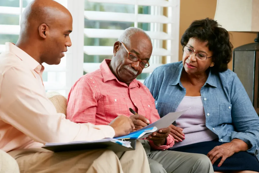 Senior couple discussing selling house