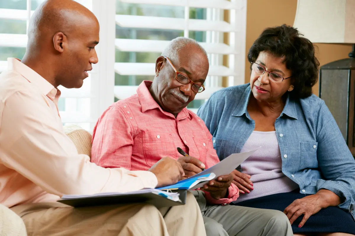 Senior couple discussing selling house
