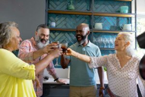Pegasus Landing of El Paso | Happy Seniors Toasting With A Drink