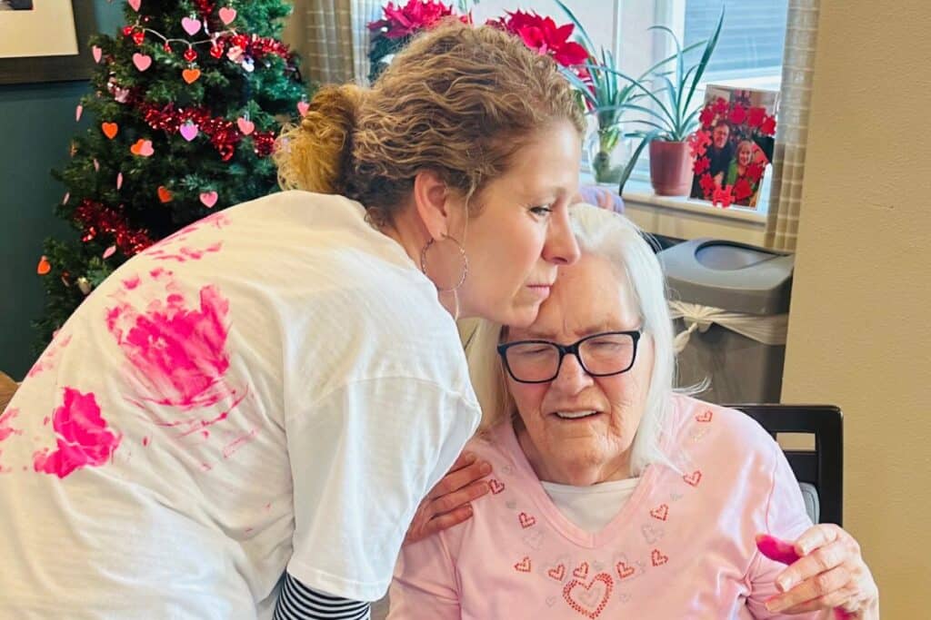 Pegasus Senior Living | Melissa S. makes a t-shirt with her mother Reva during a meaningful craft time in memory care at Pegasus Landing of El Paso.