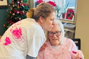 Pegasus Senior Living | Melissa S. makes a t-shirt with her mother Reva during a meaningful craft time in memory care at Pegasus Landing of El Paso.