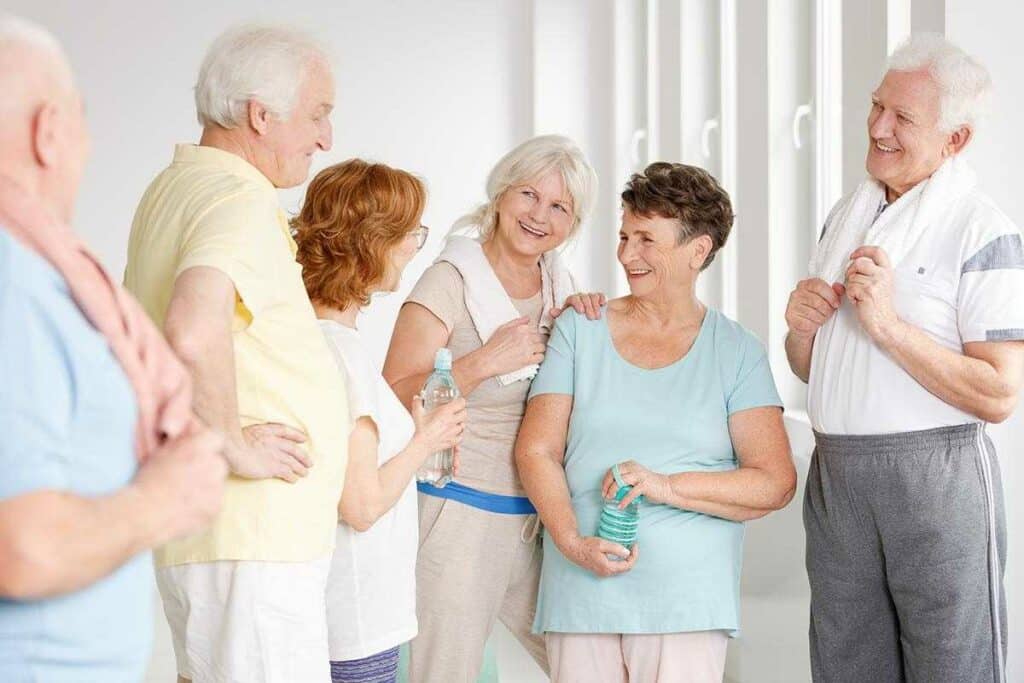 Pegasus Landing of Forest Ridge | Happy Seniors Socializing in Workout Class