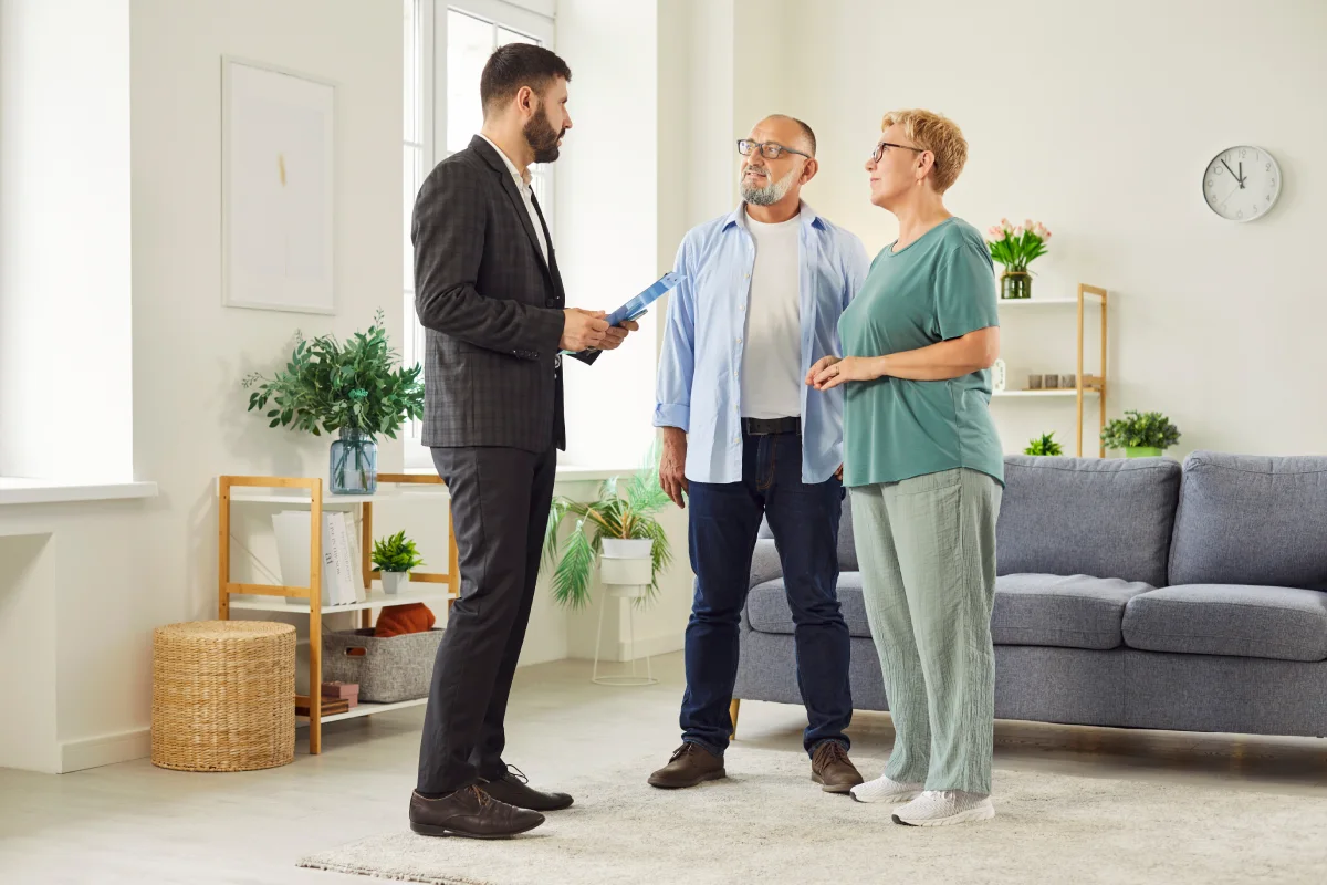Seniors comparing apartment options