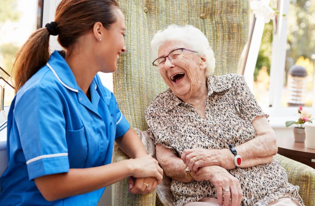 Pegasus Landing of Katy |Senior Woman and Caregiver Happily Conversing