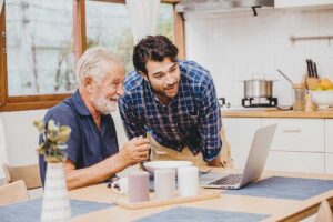 Pegasus Landing of Katy | Happy Senior Man With Adult Son