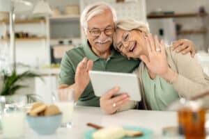 Pegasus Landing of Long Meadow in Richmond | Seniors couple doing a video call