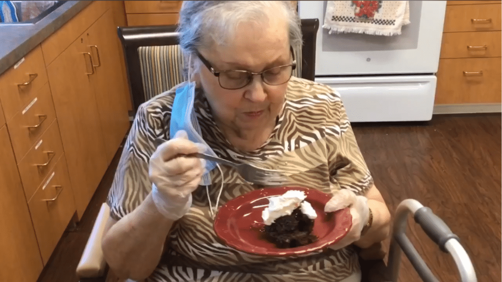 Pegasus Landing of Mesa | Resident Eating Cake