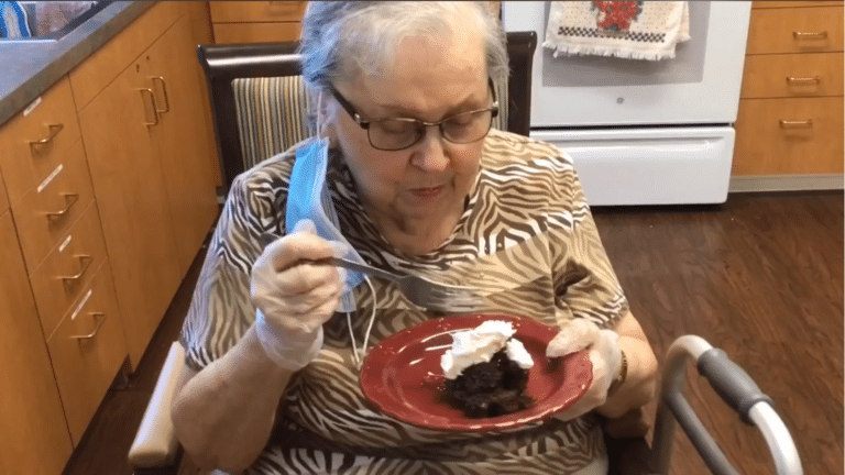 Pegasus Landing of Mesa | Resident Eating Cake