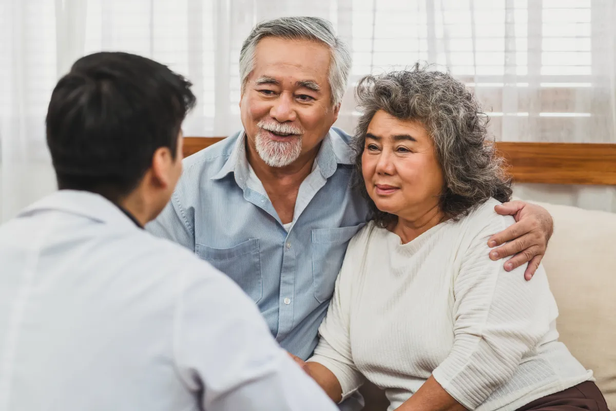 Family members discussing care options with team member