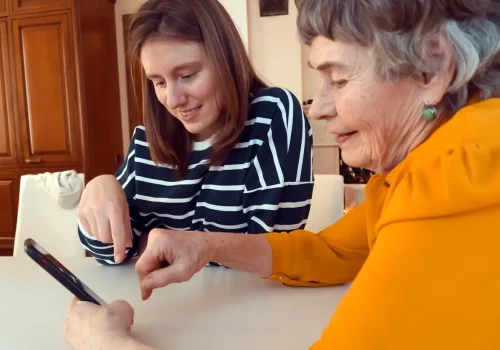 Pegasus Landing of Round Rock | Senior using cellphone