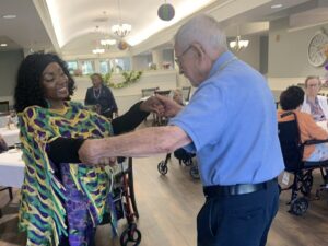 Pegasus at Tanglewood | Resident dancing with caregiver