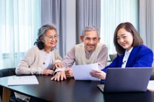 Seniors discussing finances with team member