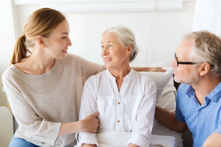 Senior couple sitting with daughter