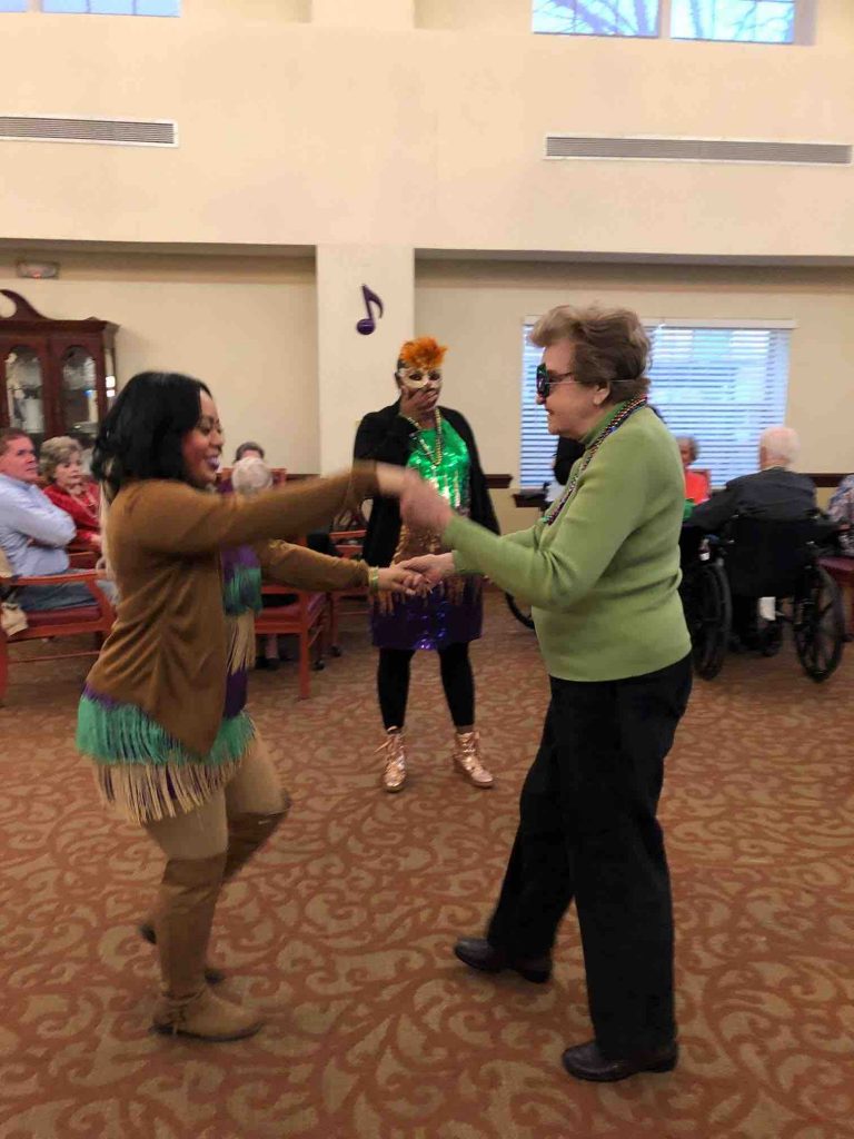 Ridgeland Place | Residents dancing with associate