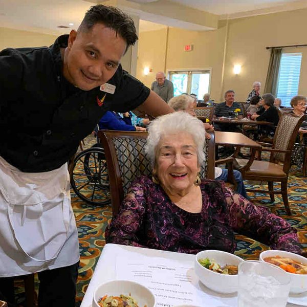 Ridgmar Place | Resident at dining table with associate