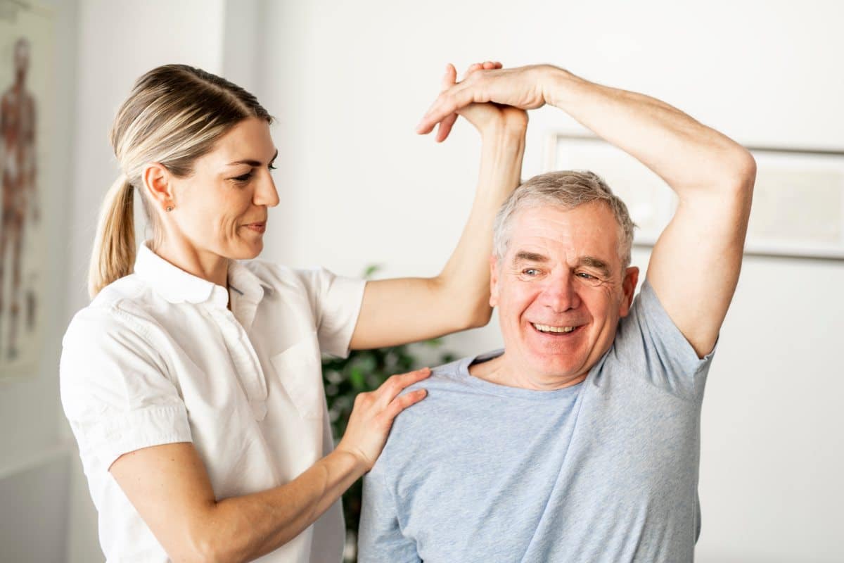 Pegasus Senior Living | Physical therapist working with a resident