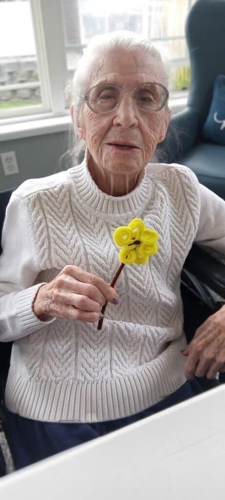 South Hill Village | Senior eating cake on her birthday