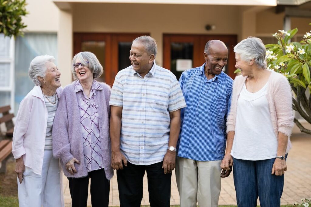 Sterling Court at Roseville | Group of seniors standing in community courtyard