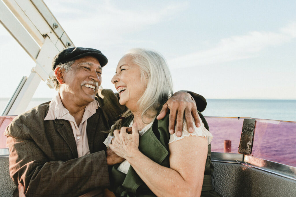 Sterling Court at Roseville | Senior couple riding a ferris wheel