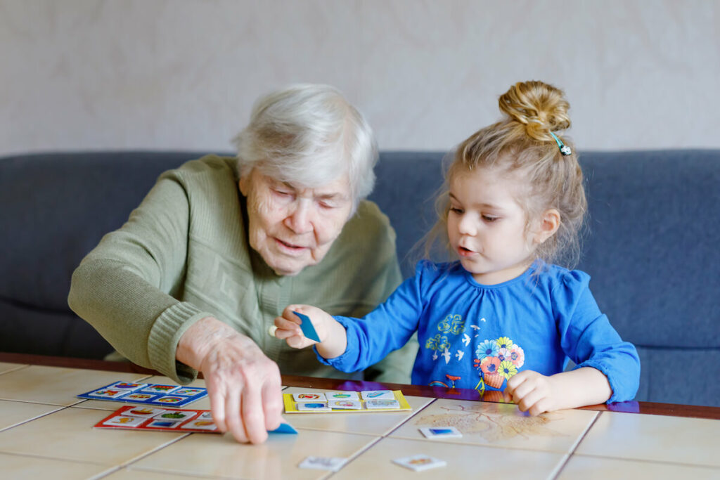 Sun City West | Senior woman and her granddaughter doing a puzzle