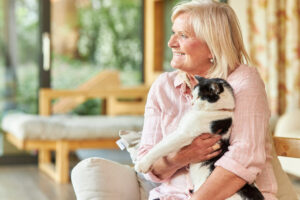 Pegasus Senior Living | Senior woman holding cat