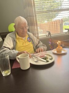 The Chateau at Gardnerville | Senior man, Richard Bell, seated at table finishing a meal