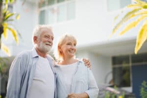 Pegasus Senior Living | Senior couple smiling outdoors
