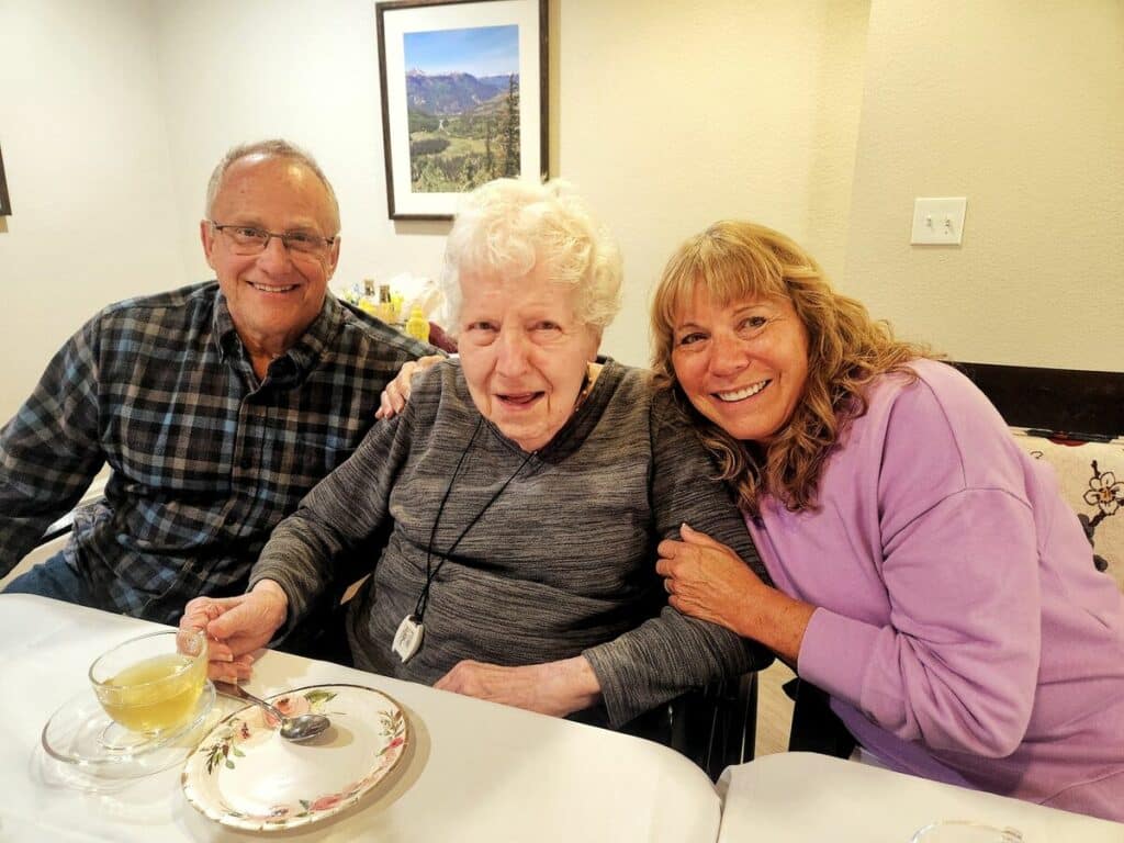 The Courtyards at Mountain View | Three people at a table